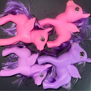 My Little Pony or similar purple and pink lot Approx 4”x5”.